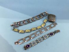 A silver vesta and three bracelets