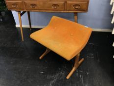A teak framed upholstered stool