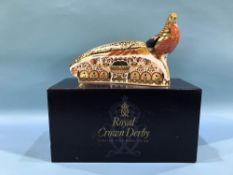 A large Royal Crown Derby 'Pheasant' paperweight (boxed)