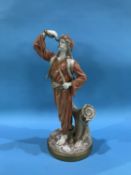 A Royal Worcester figure of Chunguin Indian Snake Charmer by J. Hadley