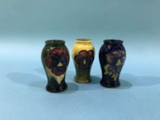 Three miniature Moorcroft vases
