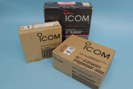A boxed ICOM IC - 2400 E, a IC - E91 handheld and an IC 2200H transceiver (3)