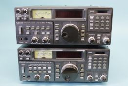 A used ICOM IC-R71E communication receiver and an ICOM IC - R7000 communication receiver