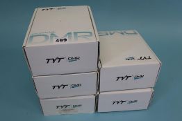 Three boxed TYT MD - 380 handhelds, a TYT MD - UV380 and a MD - 390 (5)