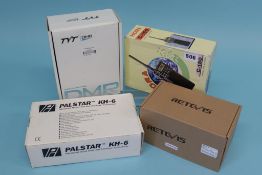 A boxed Retevis RT84, TYT MD - 390, a Hora C - 150 and a Palstar KH - 6 handheld (4)