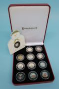 A boxed Presentation Pobjoy Mint Limited 'Snowman' Isle of Man collection coloured 50 pence set of