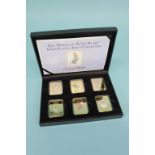 A boxed Presentation Beatrix Potter, 'The World of Peter Rabbit', gold plated ingot collection