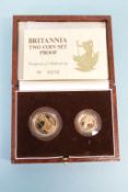A boxed Britannia two coin set proof, weight 1/4 8.513 grams, weight 1/10 3.412 grams