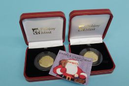Two 'Father Christmas', 2018, gold proof 50p coins