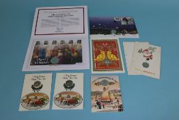 A collection of twenty five Christmas Presentation Pobjoy Mint and Westminster Cards, First Day
