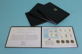 A set of four limited edition of 750, 'Beatrix Potter', UK stamp coin covers