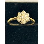 9ct Gold ring set with 7 cz stones Weight 1.4g Siz