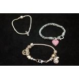 Silver charm bracelet & 2 others