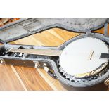 Remo weather king banjo with hard case