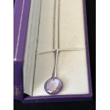 Boxed silver magnifying necklace
