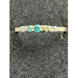 9ct Gold ring set with multi coloured gemstones 1.
