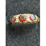 9ct Gold ring set with 3 red diamonds & diamonds 3