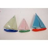 A set of 3 wade sailing yachts (Green, blue & pink