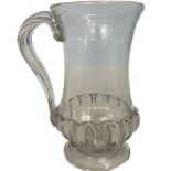 A Georgian tankard of waisted form with gadrooned
