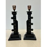 Pair of arts & crafts candle sticks