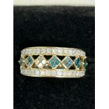 10ct Gold ring set with diamonds & blue gem stones