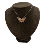 9ct gold chain & butterfly pendant set with rubies