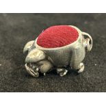 Silver pig pin cushion