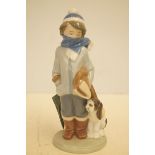 Lladro 5220 figure of a boy with dog & box