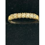 9ct Gold ring set with 7 cz stones Size Q 1.7g