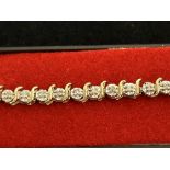 9ct gold tennis bracelet - 53 diamonds