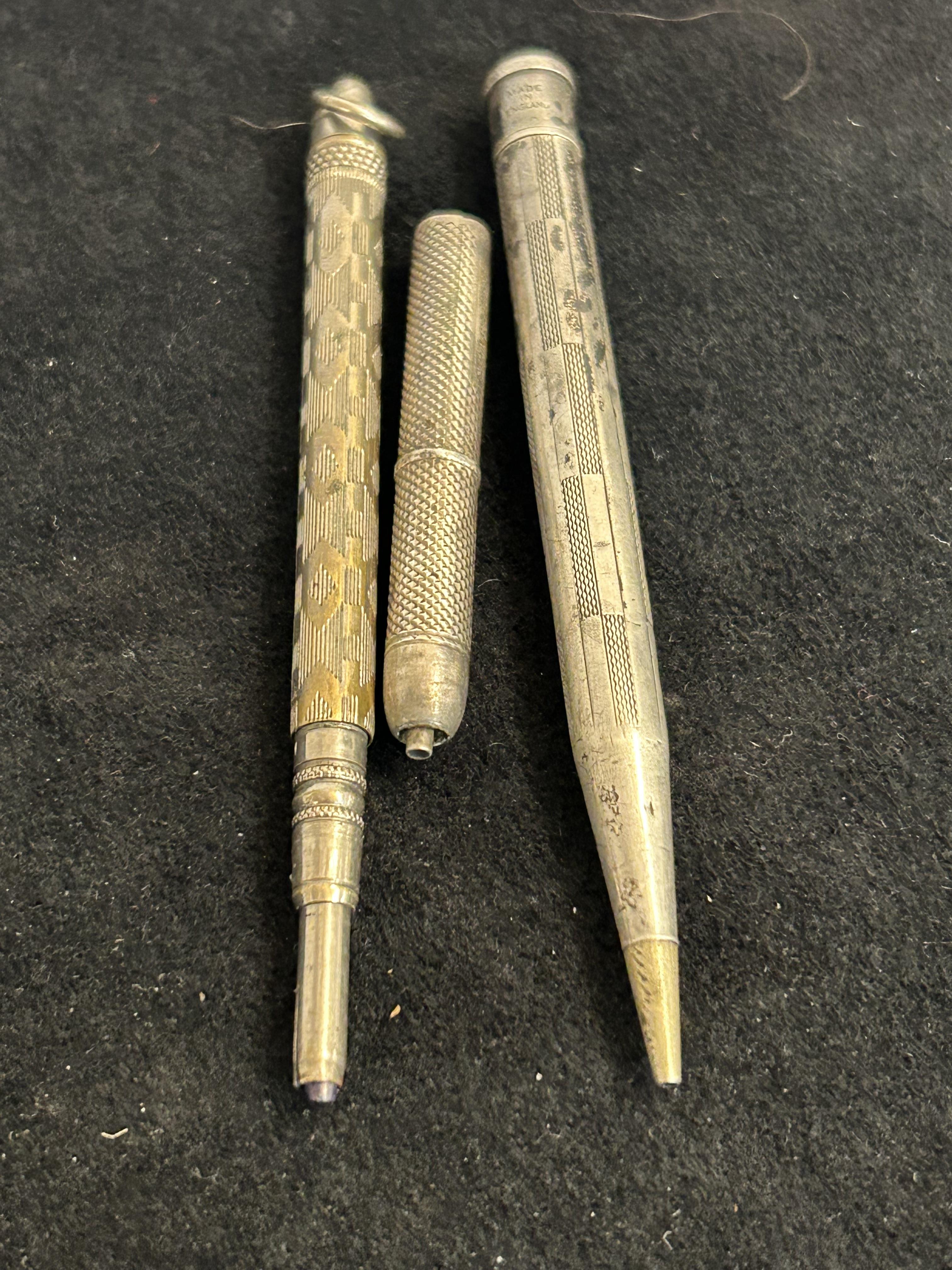 3 Silver pencils