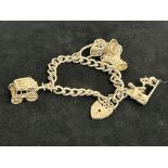 Silver charm bracelet - 4 charms