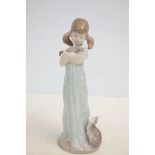 Lladro 5743 figure of a girl with cat with box