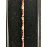 9ct Gold bracelet set with rubies & diamonds 7g