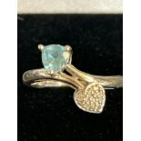 9ct White gold ring heart shaped set with aquamari