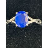 9ct White gold ring set with sapphire & diamonds S