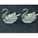 2x White metal salts in the form of swans