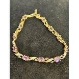 9ct Gold bracelet set with diamonds & purple stone