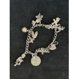 Silver charm bracelet - 10 charms