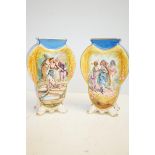 Pair of continental vases - 1 restored