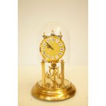 Anniversary clock with glass dome Height 31 cm