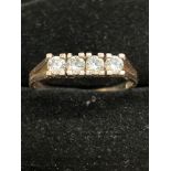 9ct Gold ring set with 4 white stones Size N