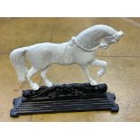 Cast iron horse door stop