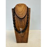 Wooden necklace stand