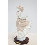 Elegant collection porcelain figure of wooden base