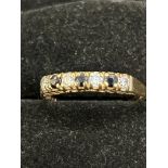 9ct Gold ring set with sapphire & white stone Size