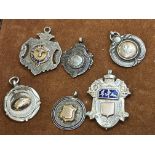 6 Silver watch fobs