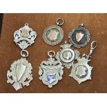 7 Silver watch fobs