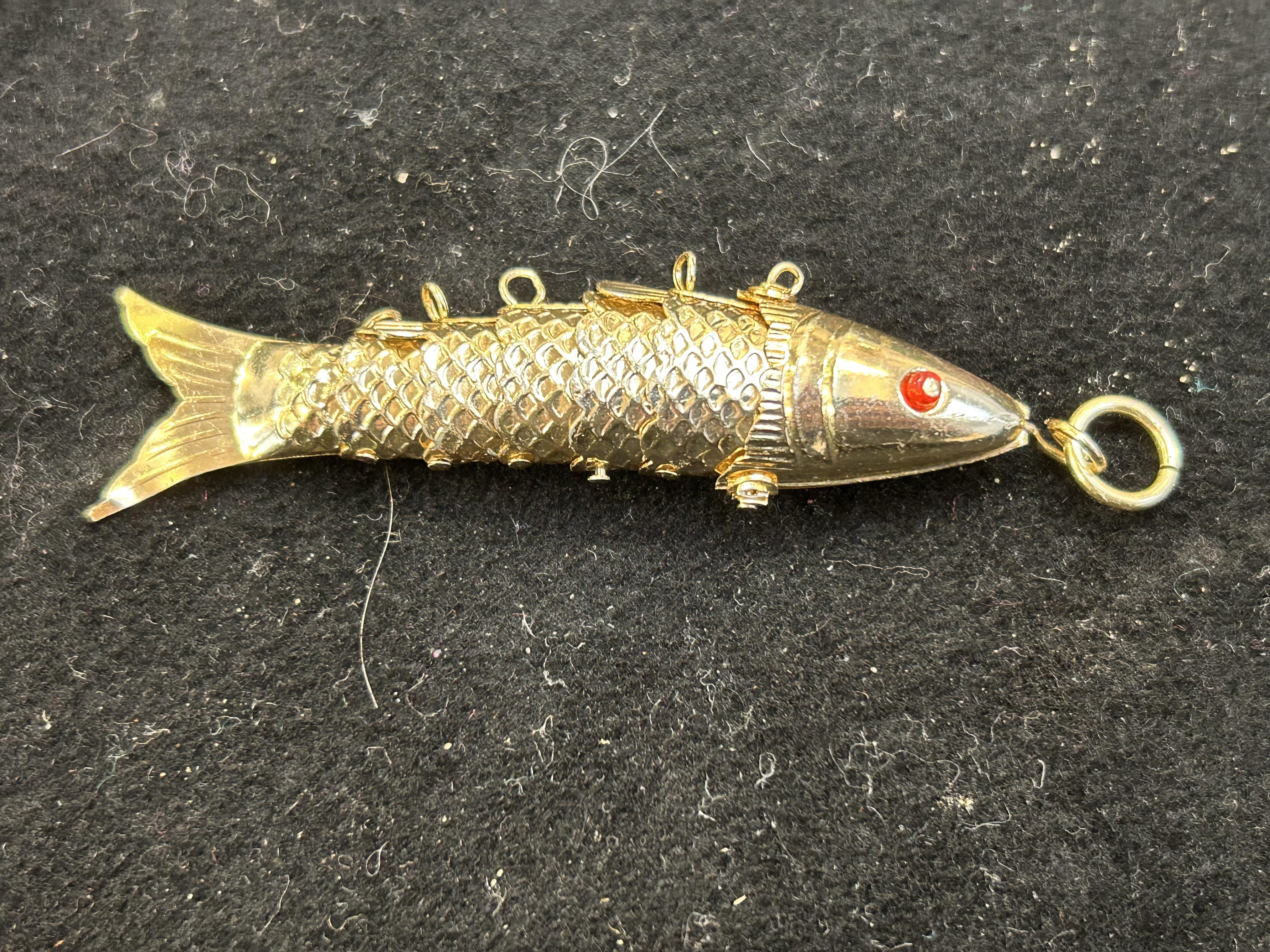 Yellow metal articulating fish pendant - tested fo