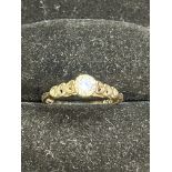 9ct Gold ring set with central solitaire white sto